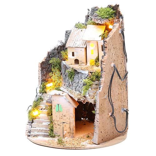 Nativity village with grotto, illuminated with 10 lights 24x18cm 6
