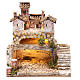 Nativity scene with a cave and a group of houses 25x25x20 cm s1