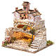 Nativity scene with a cave and a group of houses 25x25x20 cm s2