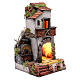 Neapolitan nativity scene setting composed by house with chimney and lights s3