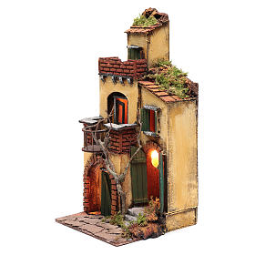 House with round balcony and light for nativity scene setting