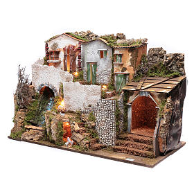 Nativity scene setting with houses  55x75x40 cm, a waterfull and lights.