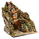 Village with hut, lights and a water pump 35x30x25 cm for Neapolitan nativity scene s3