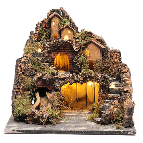 Nativity village in country style with illuminated grotto and river 1