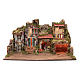 Presepe ambientazione 45x80x45 cm luci e donna in movimento s1