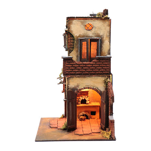 Nativity scene setting double arched house with light and fireplace 2
