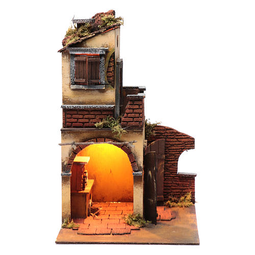Nativity scene setting double arched house with light and fireplace 3