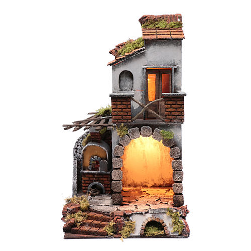 Nativity scene setting arched house with light and fireplace 45x25x25 cm 1