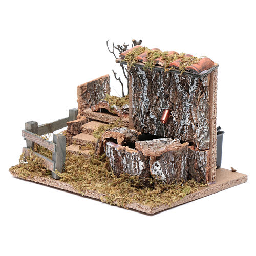 Nativity scene fountain with pump on rocky wall and roof 2