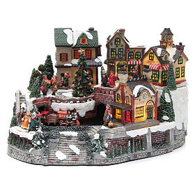 Animated Christmas village with train 35x25x20 cm