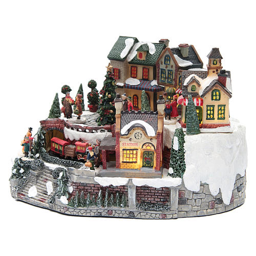 Animated Christmas village with train 35x25x20 cm 2
