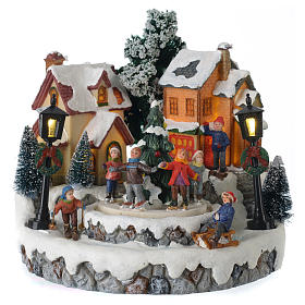 Christmas village with Ring a Ring-o' roses game and tree of 10 cm diameter