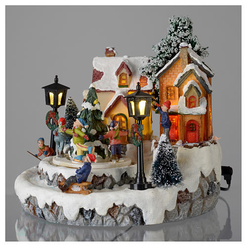 Christmas village with Ring a Ring-o' roses game and tree of 10 cm diameter 3