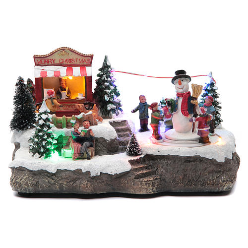 Christmas village with Ring a Ring-o' roses game and snowman  25x15x15 cm 1