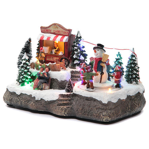 Christmas village with Ring a Ring-o' roses game and snowman  25x15x15 cm 2