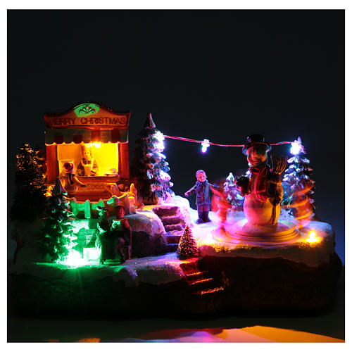 Christmas village with Ring a Ring-o' roses game and snowman  25x15x15 cm 5