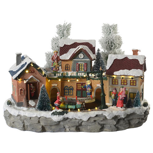 Winter village with moving train  35x20x25 cm 1
