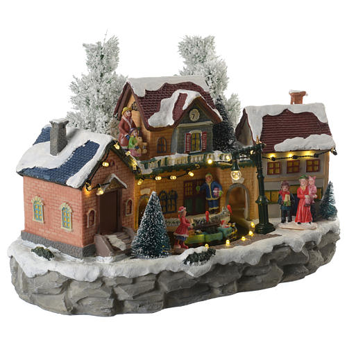 Winter village with moving train  35x20x25 cm 3