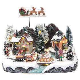 Winter village with Father Christmas's sleigh 30x25x25 cm