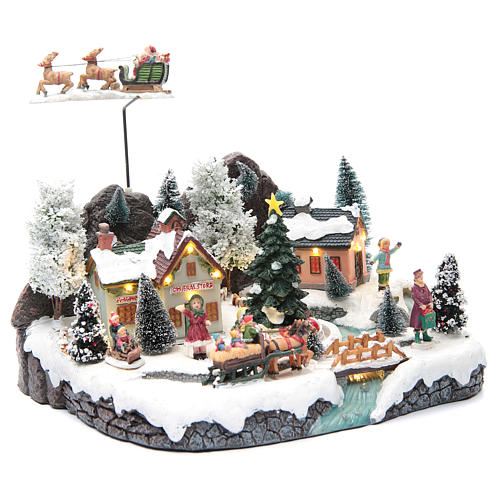 Winter village with Father Christmas's sleigh 30x25x25 cm 3
