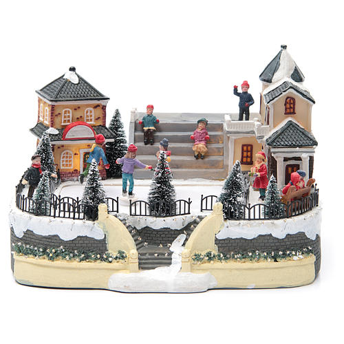 ice skaters for Christmas village 20x20x20 cm with lights and music 1