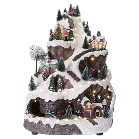 Pueblos navideños en miniatura: Paisaje navideño con montaña y movimiento 45x30x25 cm