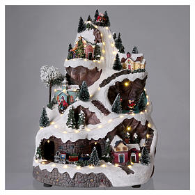 Villages de Noël miniatures: Village animé avec montagne 45x30x25 cm