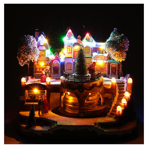 Christmas village with moving train 25x25x20 cm 4