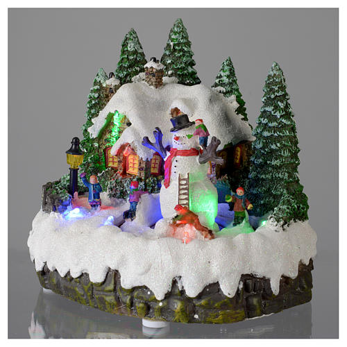 Villaggio di Natale illuminato pupazzo di neve movimento 20x20x15 cm 3