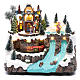 Musical christmas village with moving train and ice skating 25x25x15 cm s2