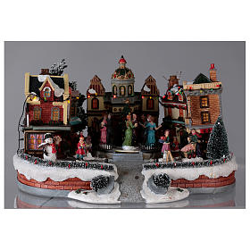 Pueblos navideños en miniatura: Escena de Navidad con pista de baile en movimiento 25x40x40 cm