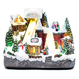 Moving Christmas ski slope with tree 25x30x15 cm