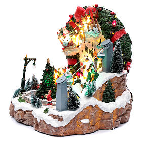 Pueblos navideños en miniatura: Escena de Navidad con luces y tren en movimiento 30x30x25 cm