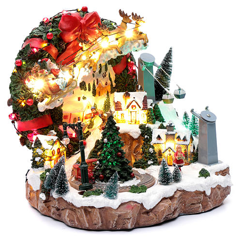 Escena de Navidad con luces y tren en movimiento 30x30x25 cm 3