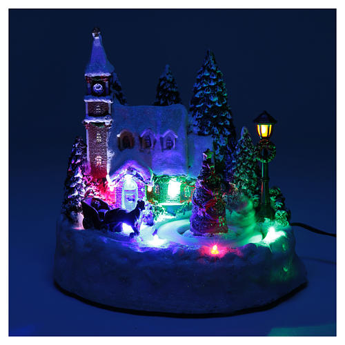 Illuminated Christmas village with moving children 20x20x15 cm 4
