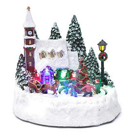 Villaggio di Natale illuminato bambini in movimento 20x20x15 cm