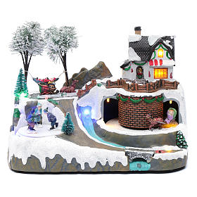 Pueblos navideños en miniatura: Paisaje de Navidad con música y niños en movimiento 20x25x20 cm