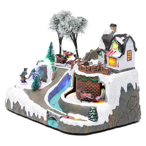 Christmas village with music 20x25x20 cm with moving children ice skating 2