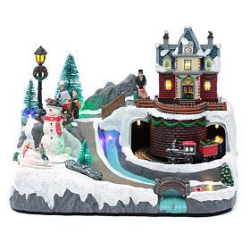 Villaggio Natalizio musica 20x25x20 cm trenino e pupazzo in movimento