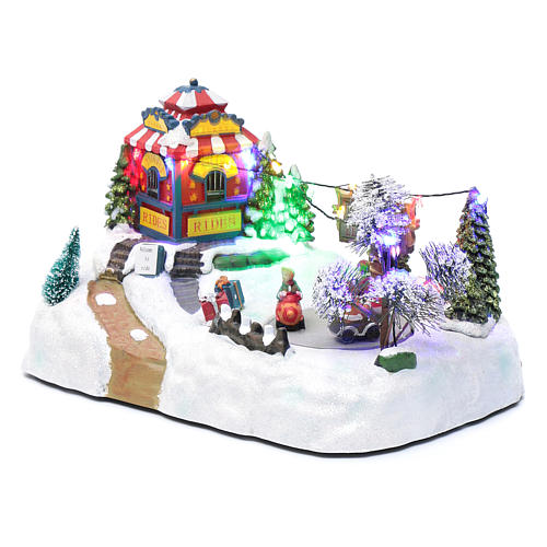 Moving christmas village with playground, led lights and music 20x25x15 cm 2