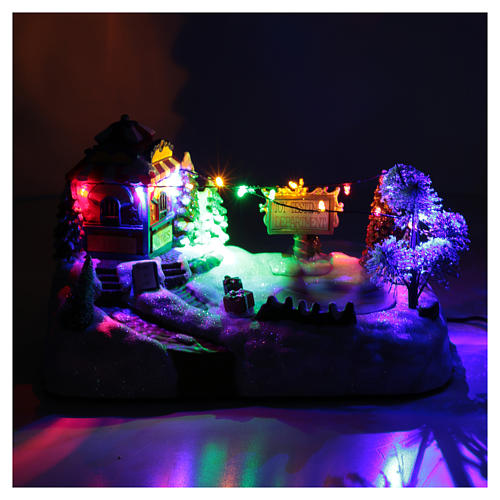 Moving christmas village with playground, led lights and music 20x25x15 cm 4