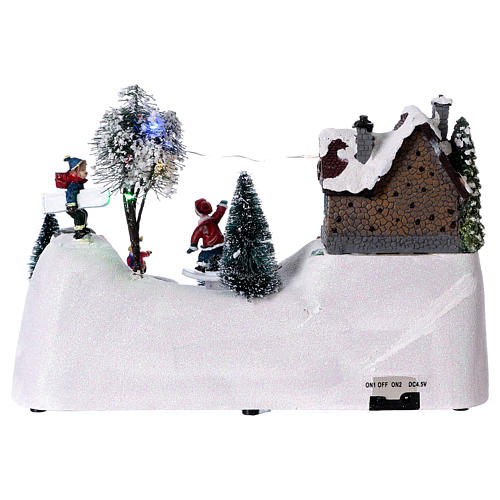 Moving christmas scene with music and ice skating rink 20x30x15 cm 5