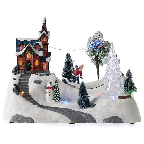 Christmas scene with church, snowman and moving tree 20x30x15 cm 1