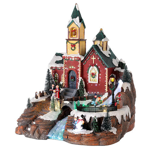 Illuminated Christmas village with animated skaters and music 38x28x30 cm 3
