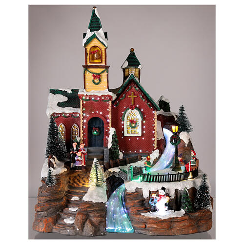 Illuminated Christmas village with animated skaters and music 38x28x30 cm 2