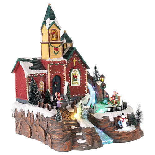 Illuminated Christmas village with animated skaters and music 38x28x30 cm 4