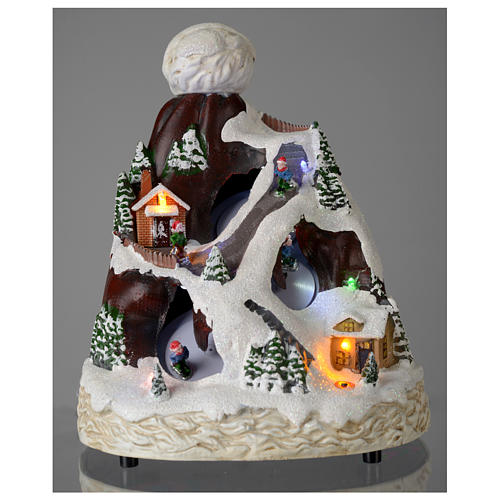 Villaggio natalizio cappello luci musicale movimento sciatori 24X19X19 cm 2