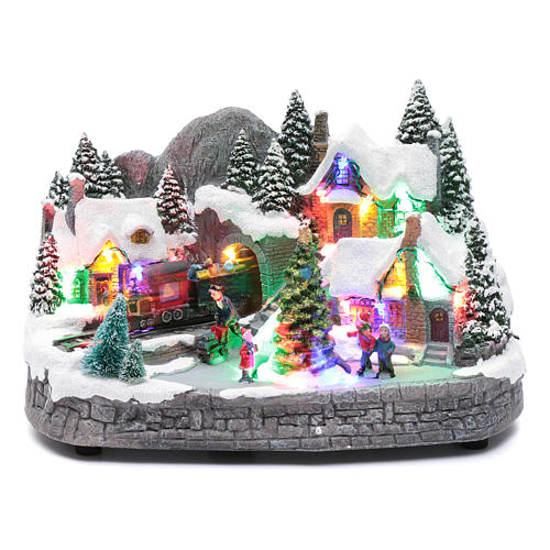 Bożonarodzeniowe miasteczko podświetlane z melodią ruchomą choinką i pociągiem 19x31x20 cm 1