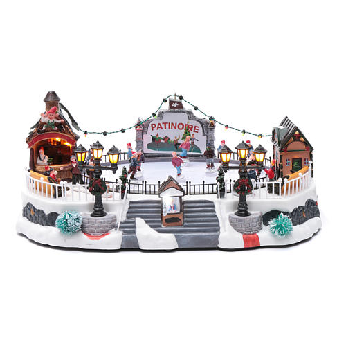 Villaggio natalizio animato luminoso musicale movimento pattinatori 18X40X27 cm 1