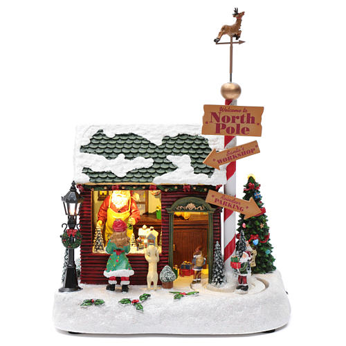Scenka świąteczna podświetlana grająca Dom Świętego Mikołaja ruchome krasnoludki 30x25x17 cm 1